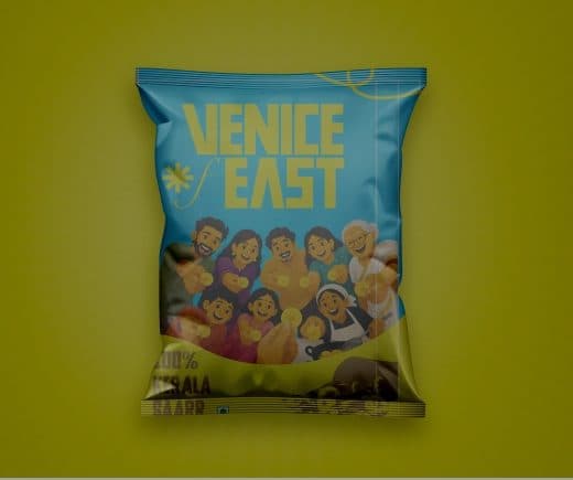 Blue Venice of East banana chip pack with a yellow wordmark and illustrated characters, on a yellow background.